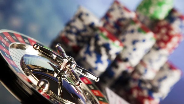 Live dealer studio setup with multiple camera angles showing blackjack table, cards, and chip racks at dubaislot login platform